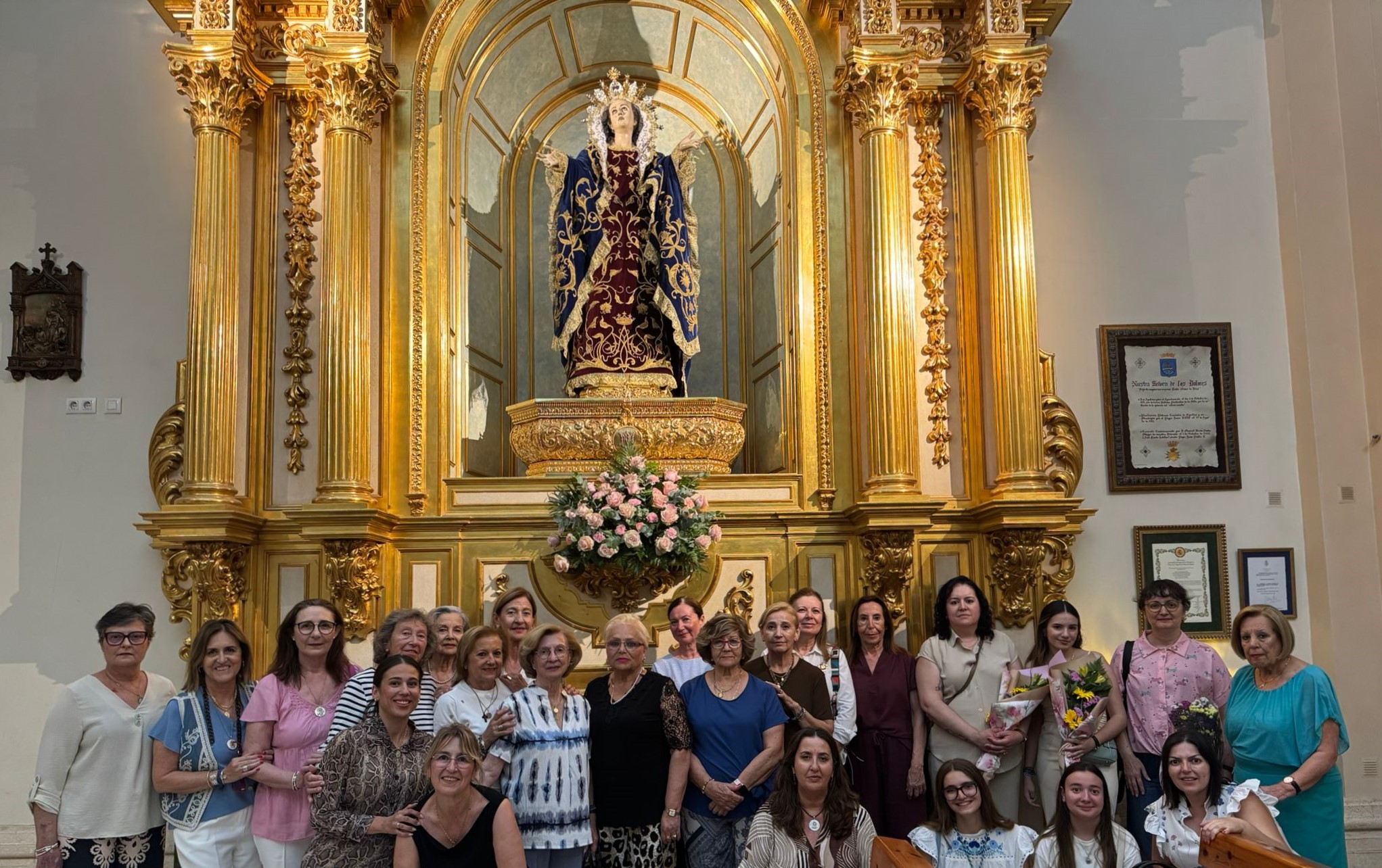 Las Damas de la Virgen de los Dolores celebran una eucaristía y ofrenda floral en honor al mes de María en Águilas