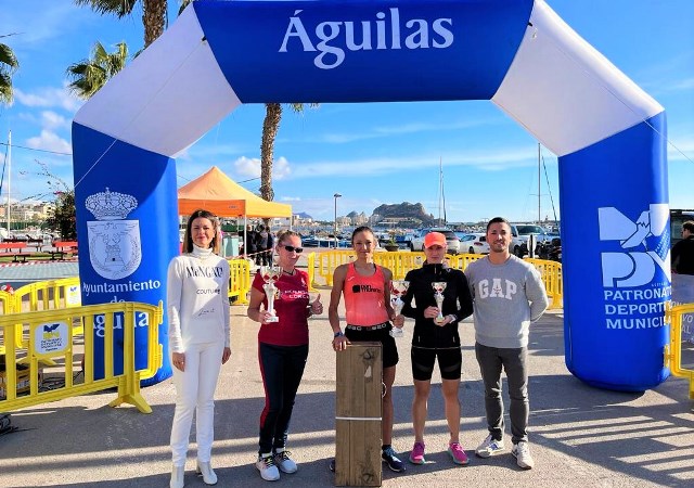 María Victoria Soler Jiménez y Andrés Méndez Lorente, ganadores de la Carrera Popular de Navidad en Águilas